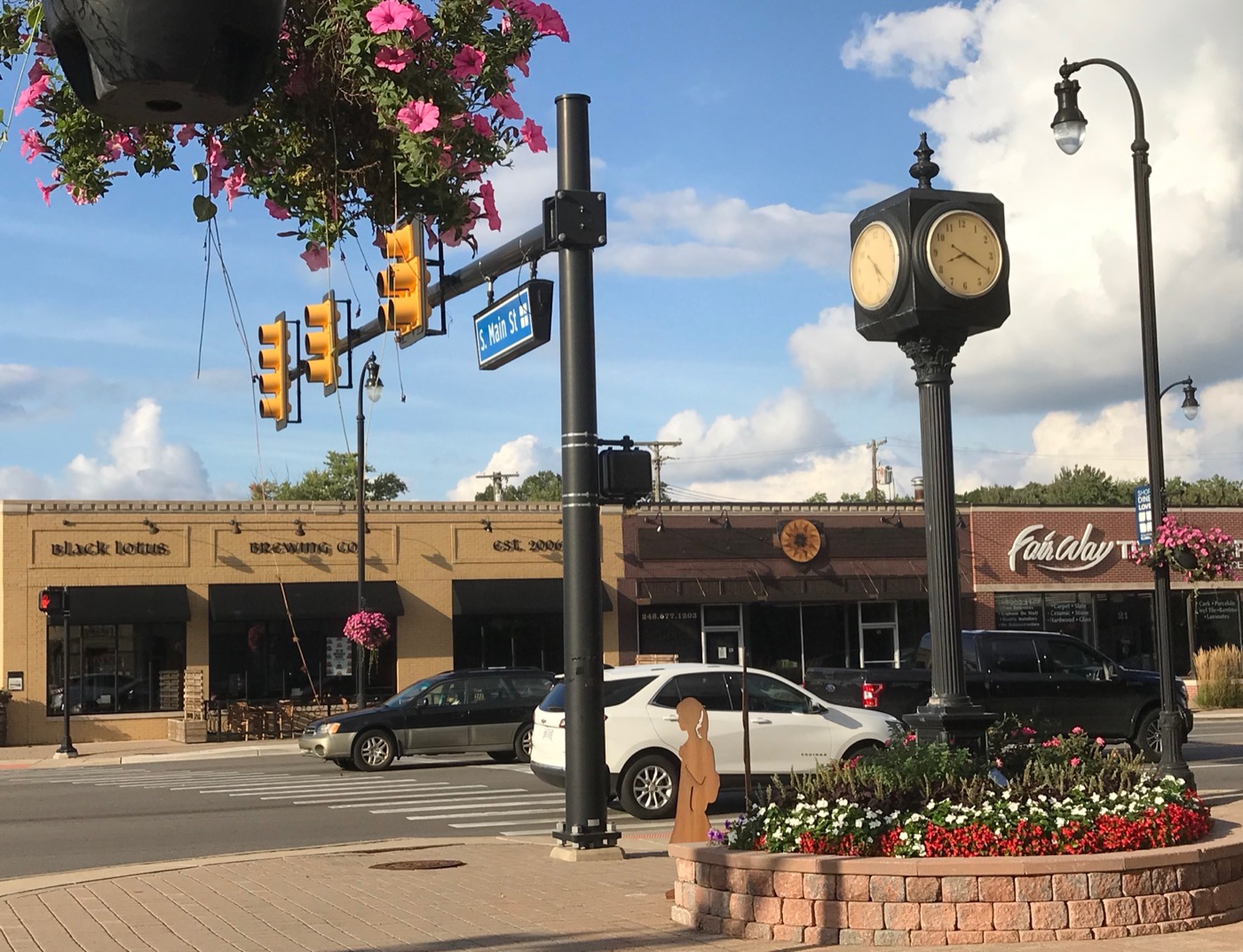 Downtown Clawson clock and storefronts at Main Street and 14 Mile Road